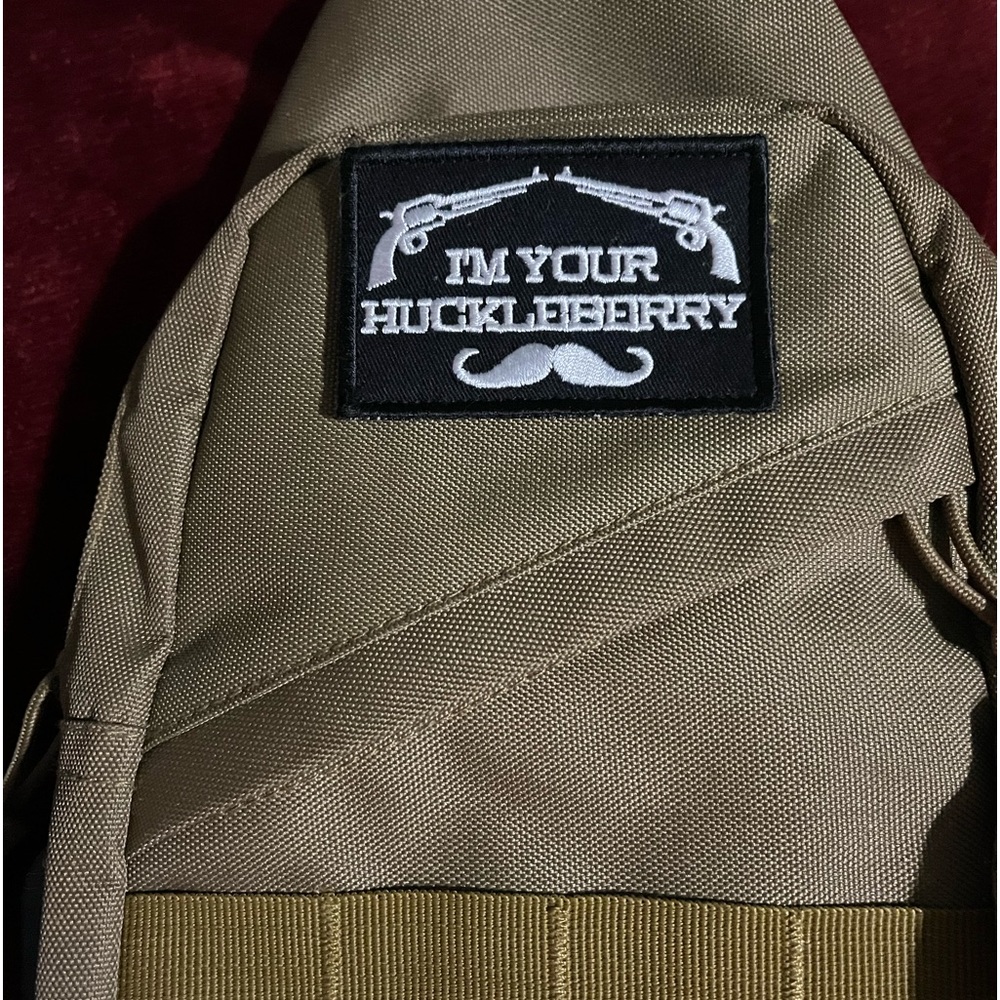 This is an over the shoulder bag… With a great patch on it. Used it once